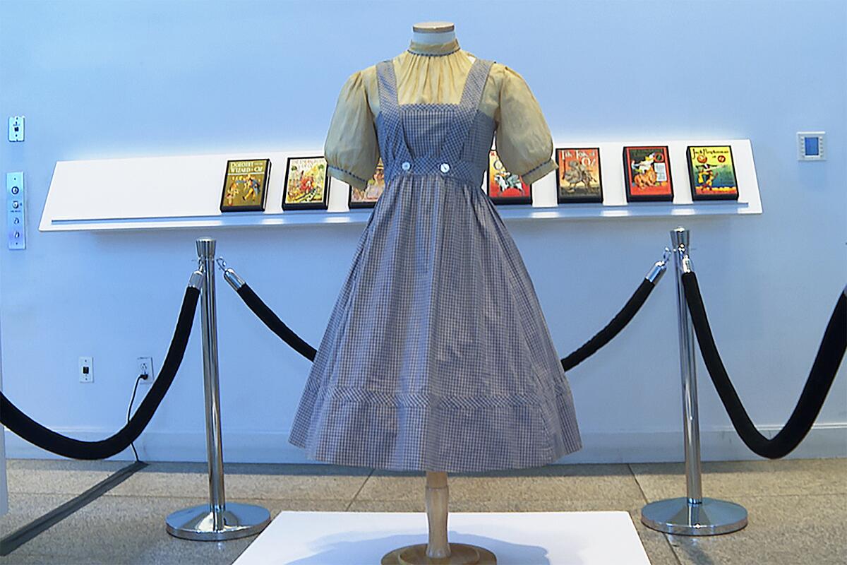 A blue and white checked gingham dress made famous in the film 'The Wizard of Oz'