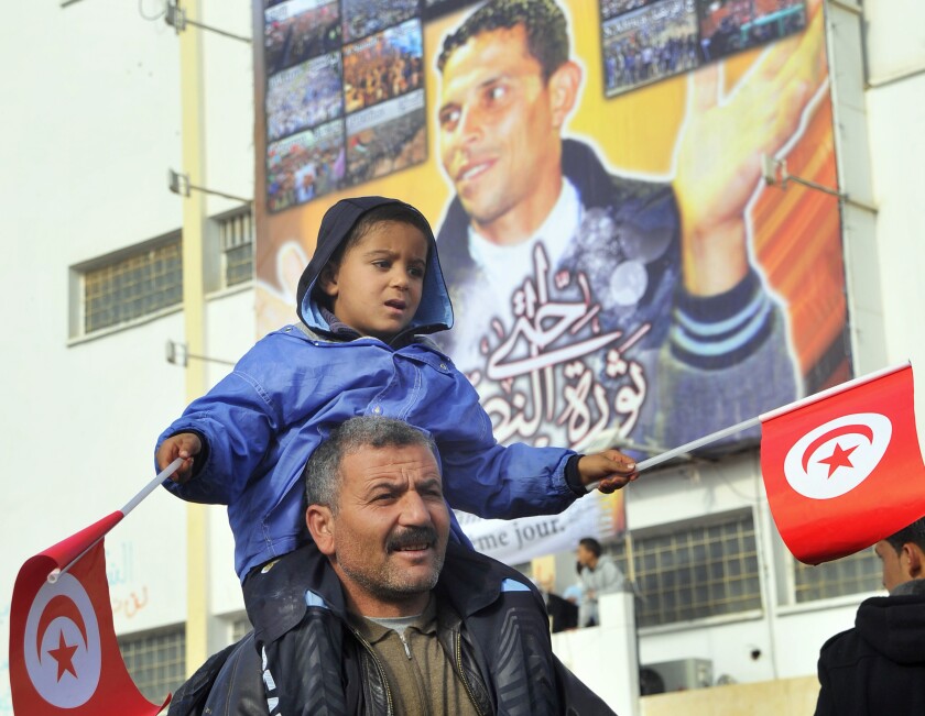 Demonstrators gather to protest against the visit of Tunisian President Moncef Marzouki on Dec. 17, 2012.