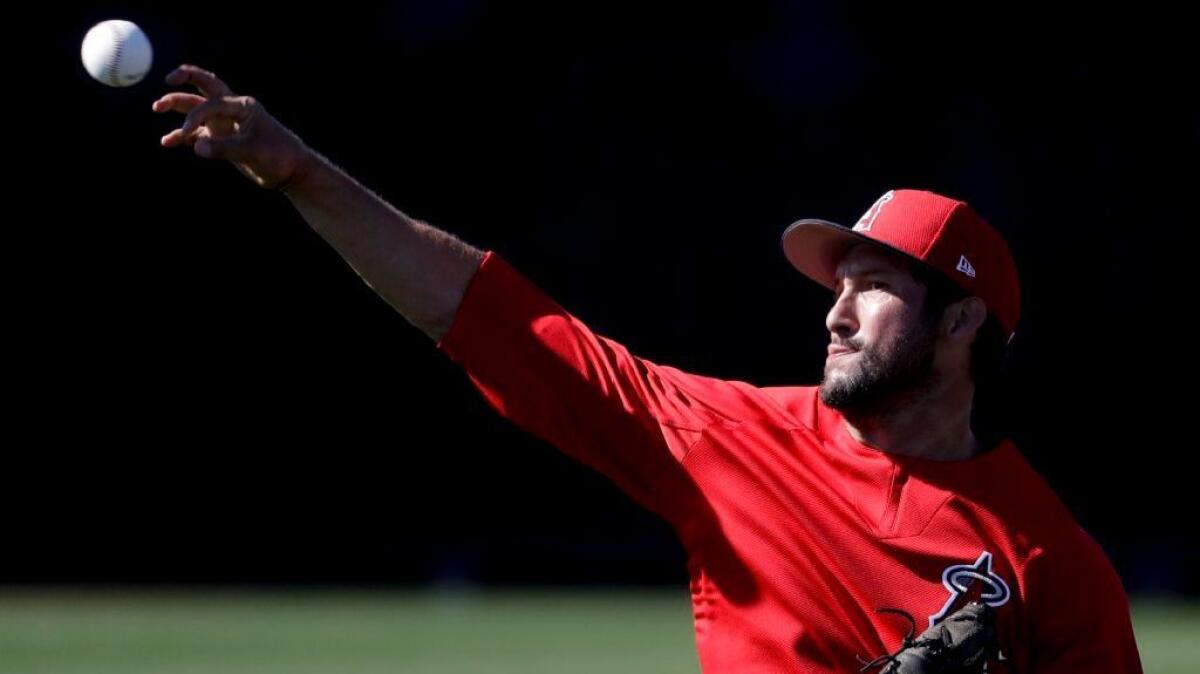 Angels relief pitcher Huston Street throws during spring baseball practice in Tempe, Ariz. on Feb. 15.