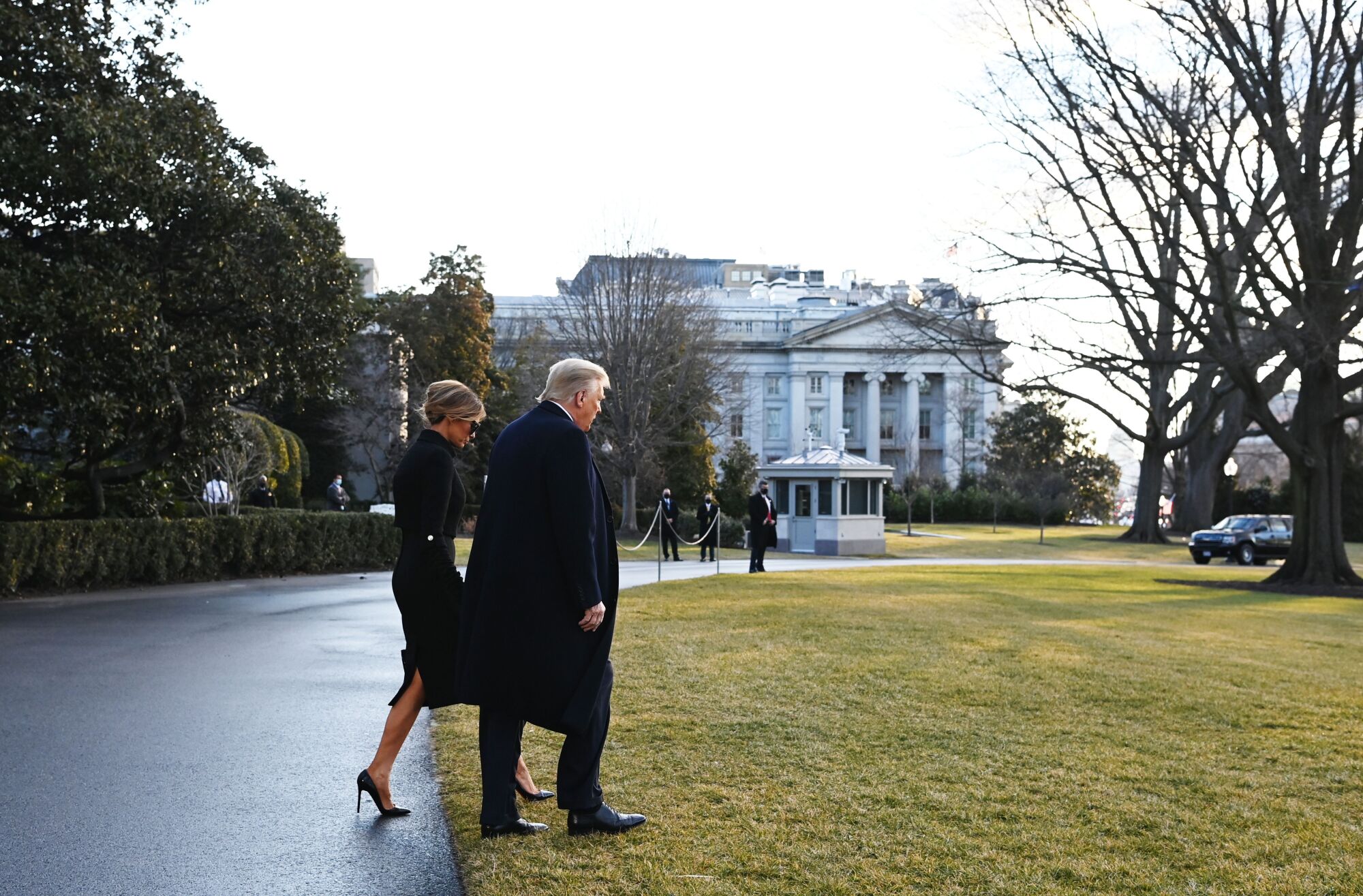 President Trump and First Lady Melania Trump make their way to Marine One as they depart the White House.