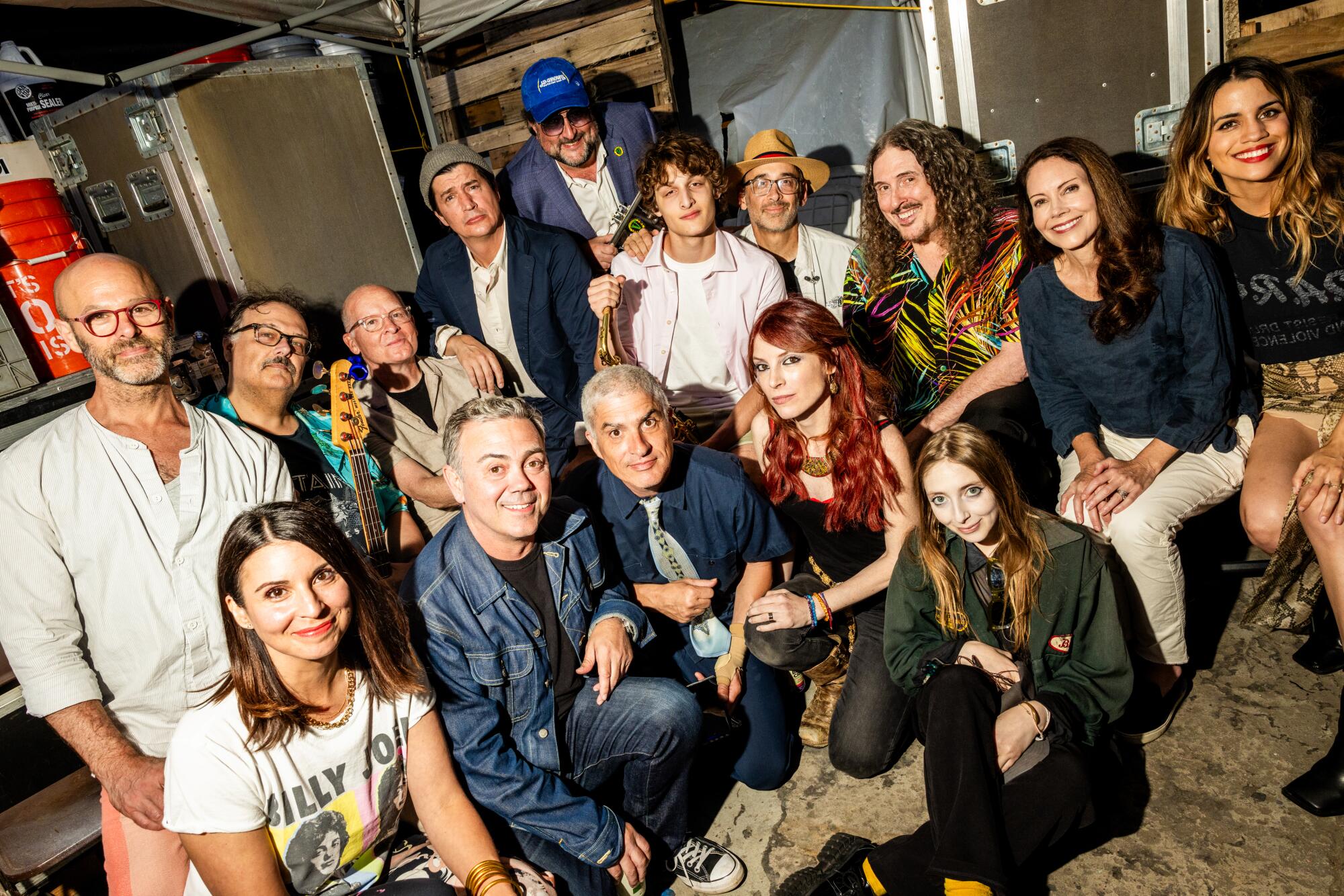 A group picture of the members of the Middle Aged Dad Jam Band.