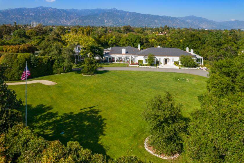 Spanning more than five acres, the property includes three structures that combine for nine bedrooms and 15 bathrooms.
