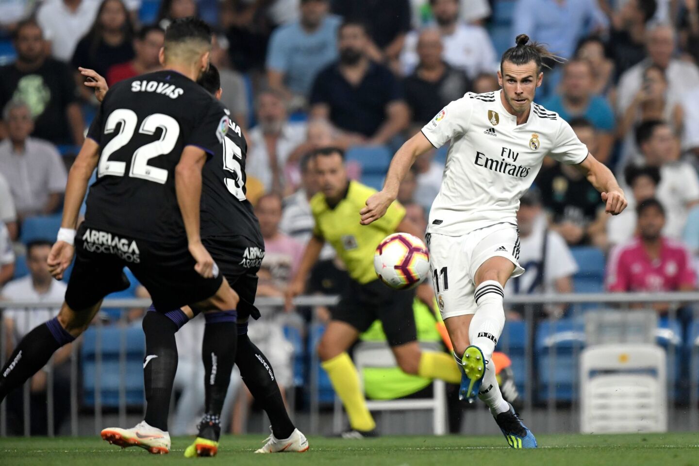 Real Madrid's Welsh forward Gareth Bale (R) challenges Leganes' Greek defender Dimitrios Siovas (L) during the Spanish league football match between Real Madrid CF and Club Deportivo Leganes SAD at the Santiago Bernabeu stadium in Madrid on September 1, 2018. (Photo by GABRIEL BOUYS / AFP)GABRIEL BOUYS/AFP/Getty Images ** OUTS - ELSENT, FPG, CM - OUTS * NM, PH, VA if sourced by CT, LA or MoD **