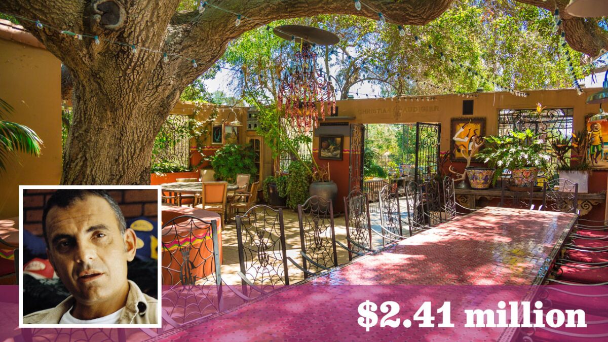A Topanga ranch owned by designer Christian Audigier at the time of his death has sold for $2.41 million.