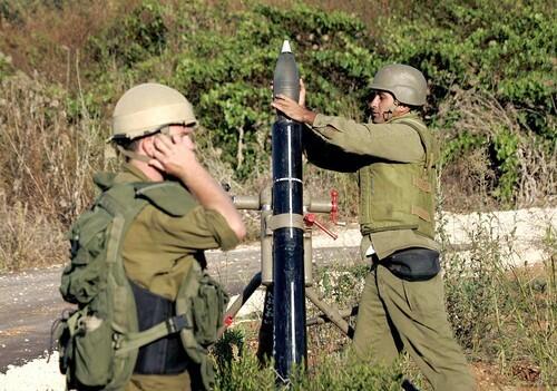 Israeli soldiers fire mortar