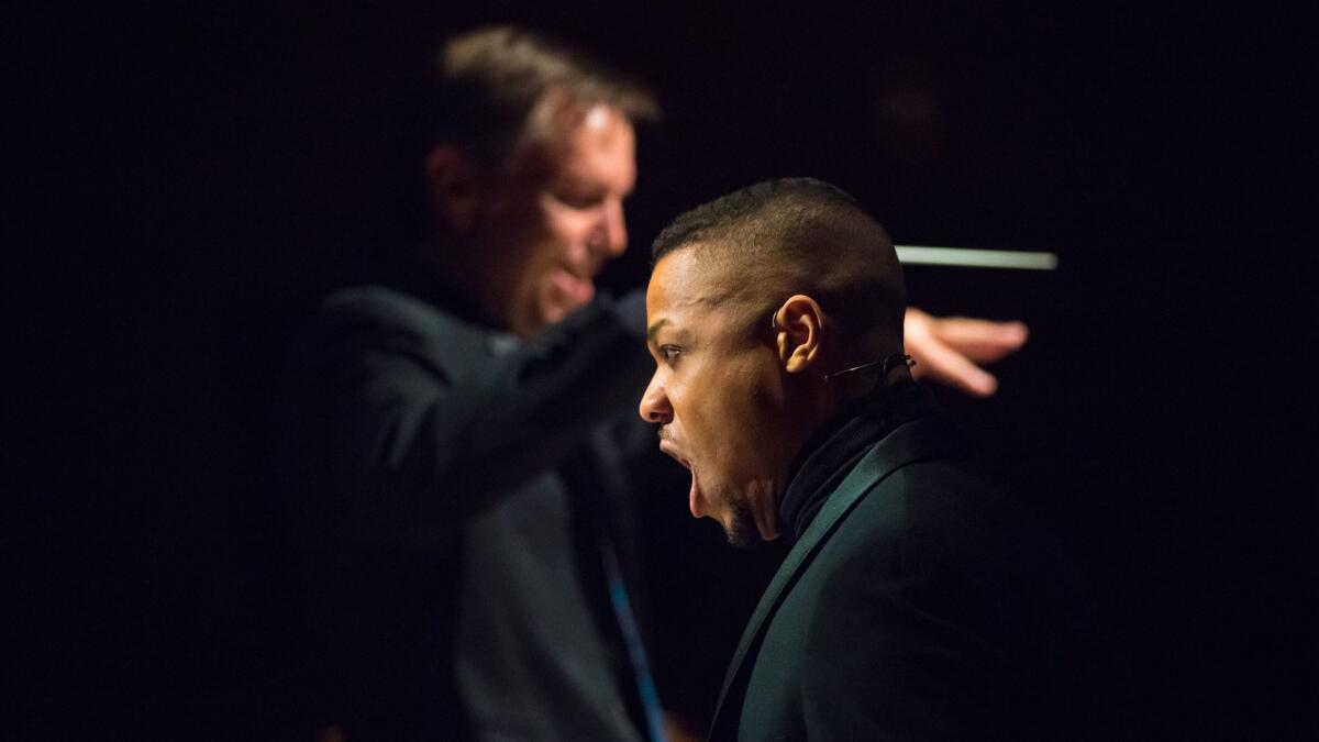 Davóne Tines sings as Grant Gershon conducts at a performance of John Adams' "El Niño."