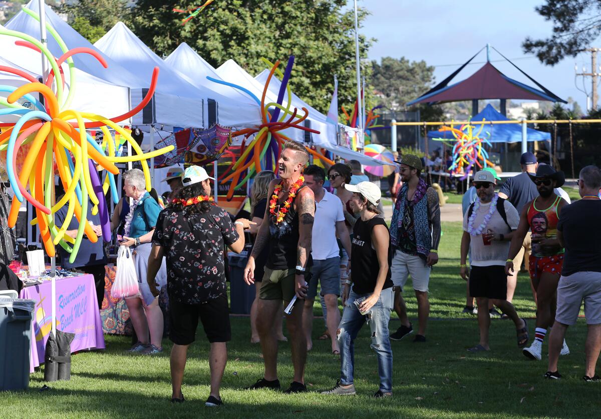 Guests attend the Laguna Beach Pride Festival at Lang Park.