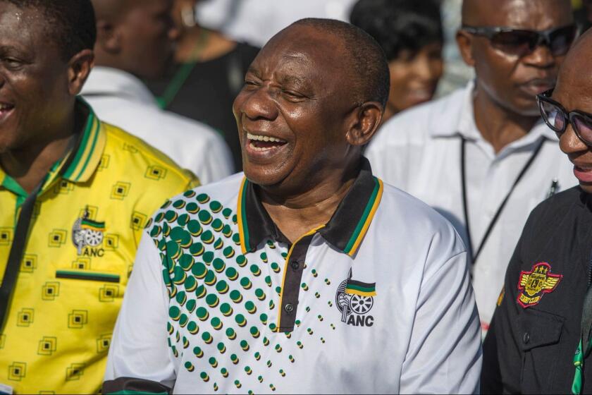 ANC ruling party newly elected president Cyril Ramaphosa arrives to take part in the fourth day of the party's annual national conference, on December 19, 2017 in Johannesburg. / AFP PHOTO / MUJAHID SAFODIENMUJAHID SAFODIEN/AFP/Getty Images ** OUTS - ELSENT, FPG, CM - OUTS * NM, PH, VA if sourced by CT, LA or MoD **