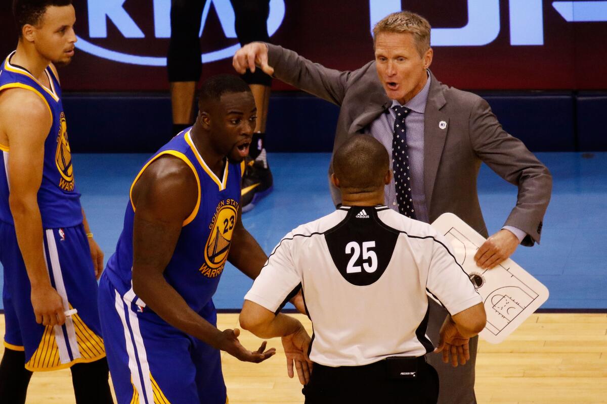 Golden State Coach Steve Kerr and Draymond Green argue with referee Tony Brothers.
