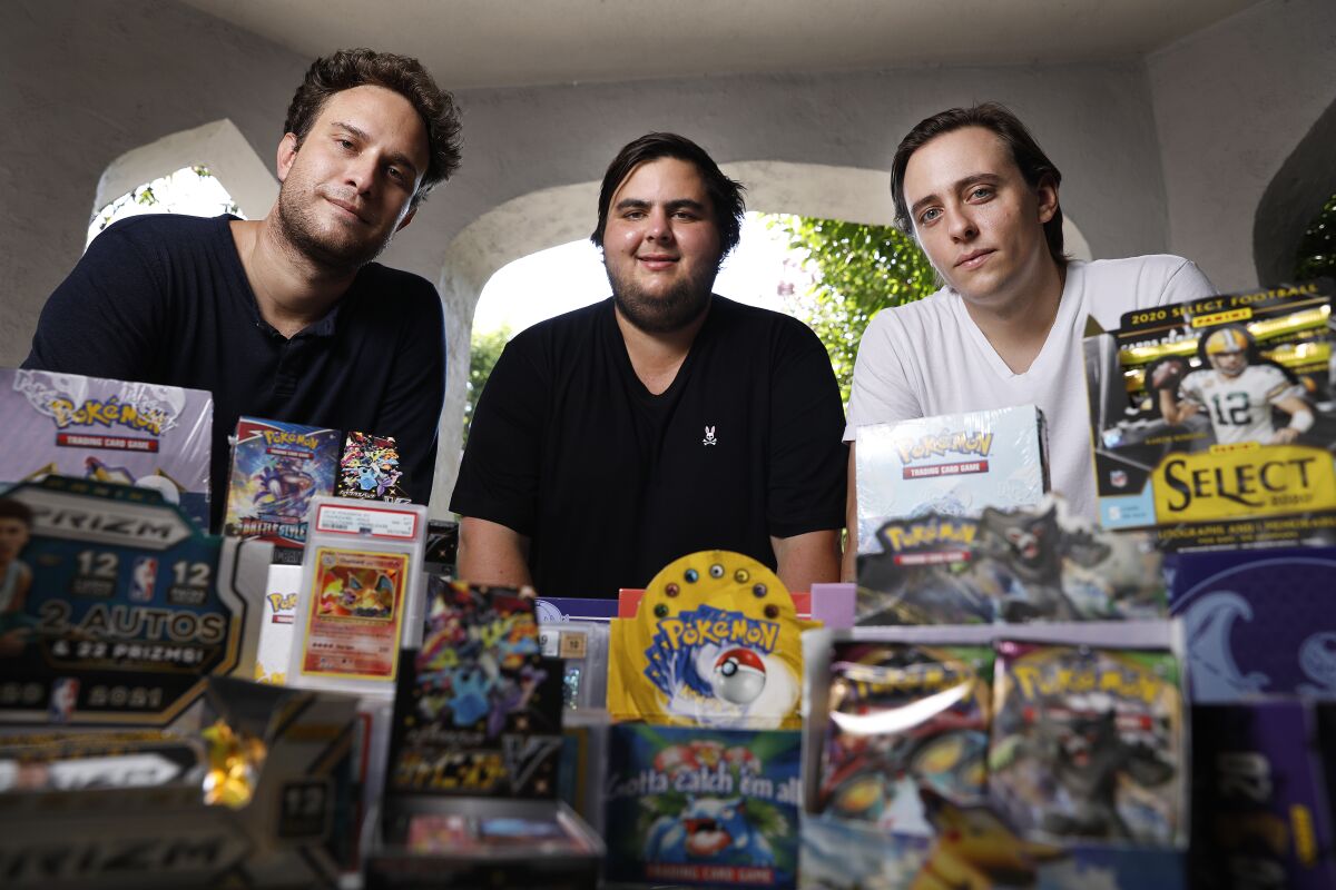 Anthony Jimenez, left, Michael Hotchkiss and Gio Mancuso run a live Instagram show selling and buying Pokémon collectibles.