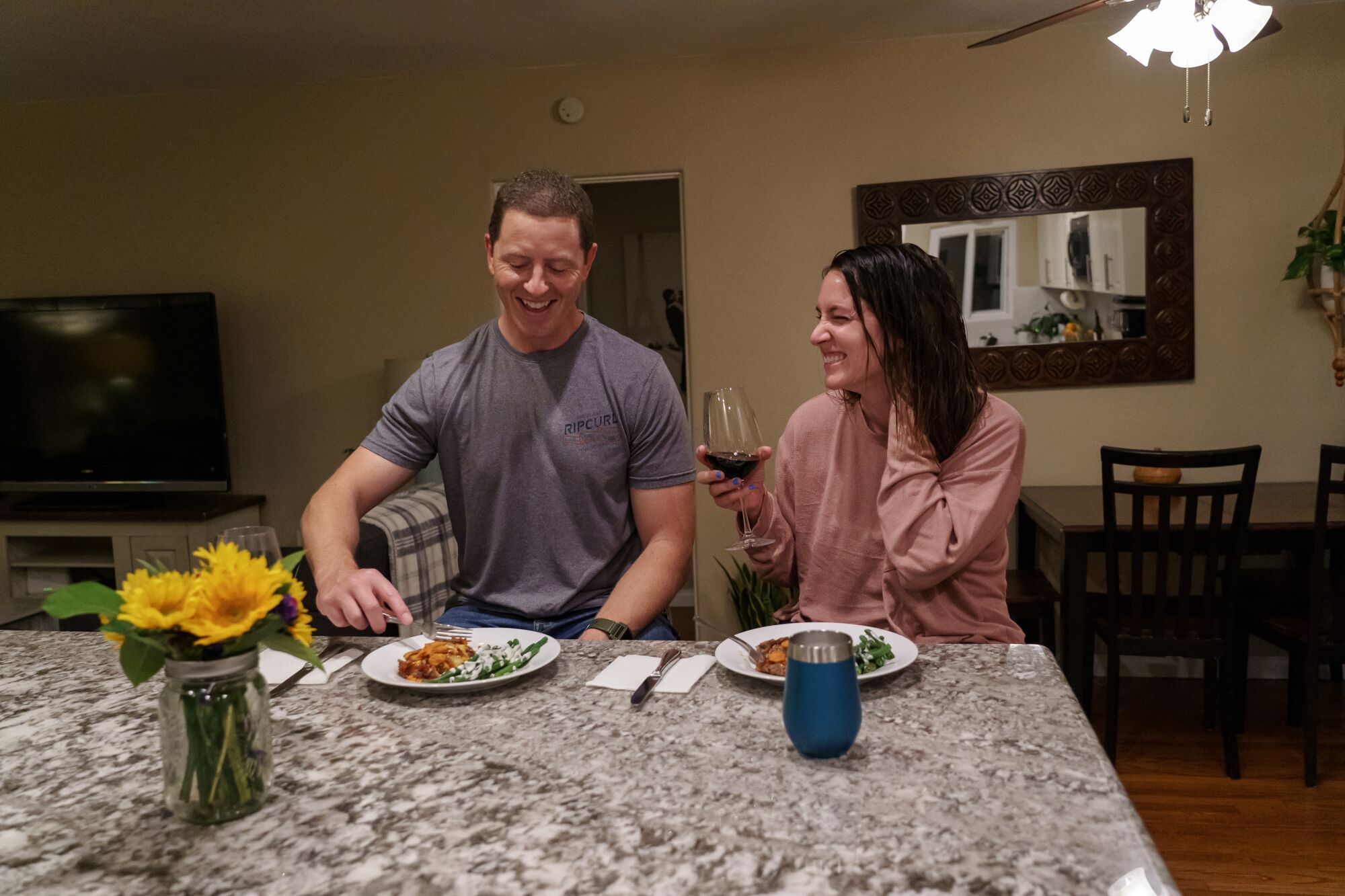 Registered nurse Erin Jenkins dines with her husband Craig Jenkins after her work shift at UC San Diego Medical Center.