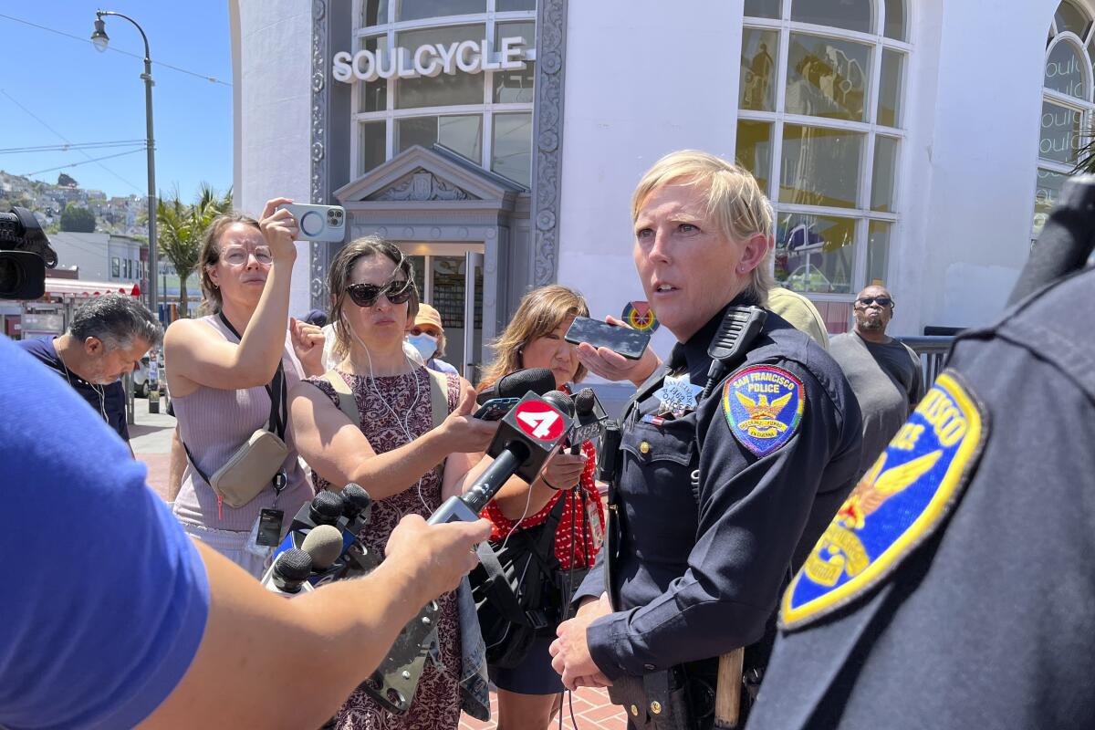 San Francisco Police Officer Kathryn Winters outside the entrance to the Castro Muni station