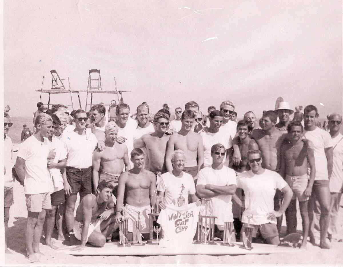 Members of the Windansea Surf Club pose in Malibu in 1963, shortly after the club was formed.