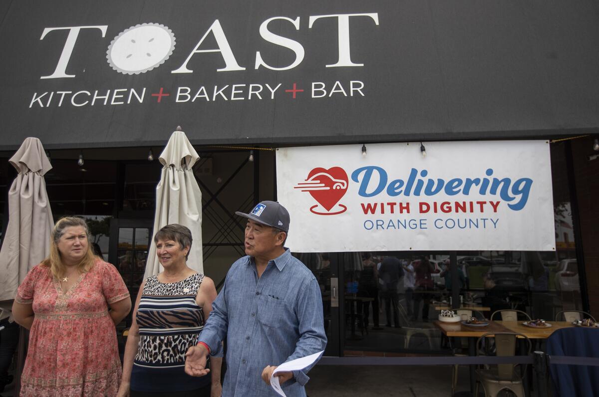 Delivering with Dignity co-founders Valerie Fryer, left, Karen Williams and Daniel Kim Wednesday at Toast Kitchen + Bakery.