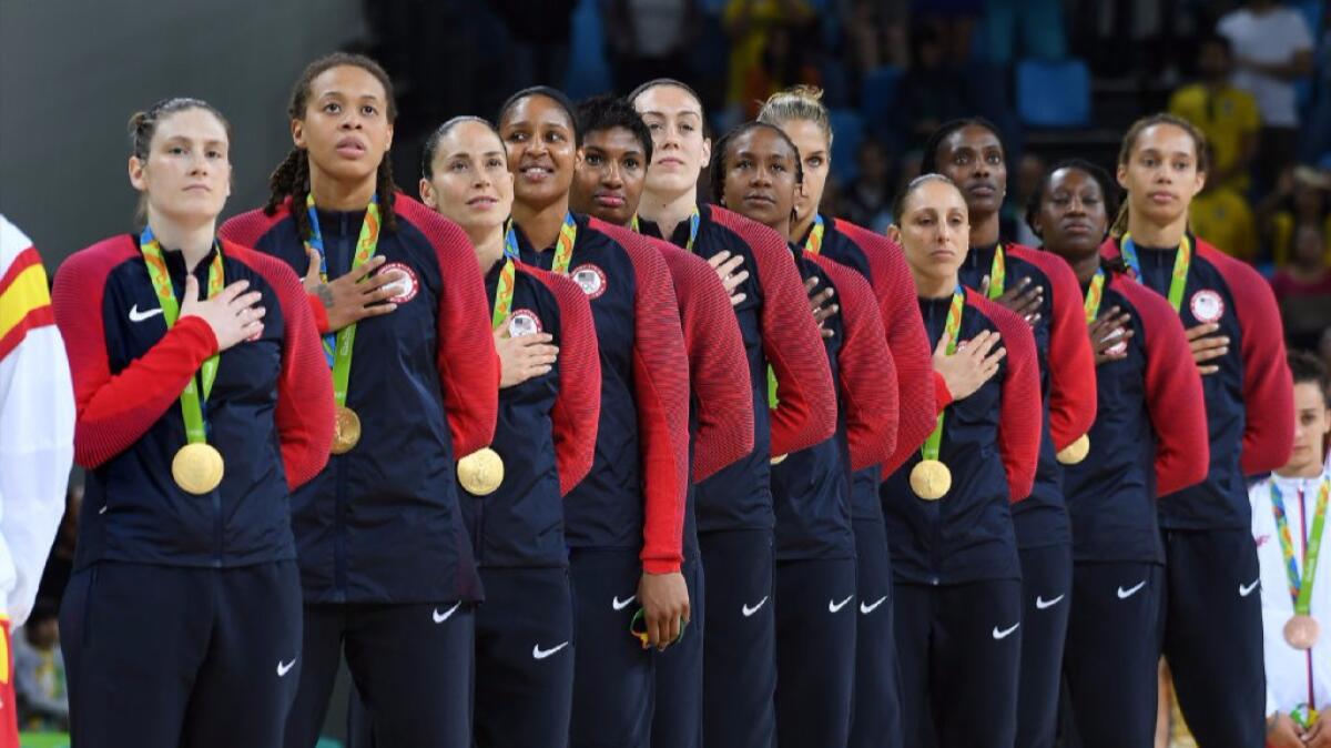 The United States women's basketball team stands during the national anthem after defeating Spain, 101-72, to win the gold medal at the 2016 Summer Games.