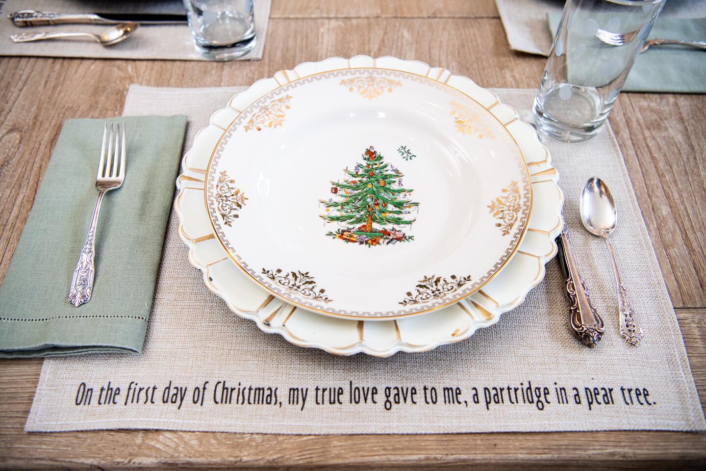 The blogger and DIY guru created the place mats, which include verses from holiday carols.