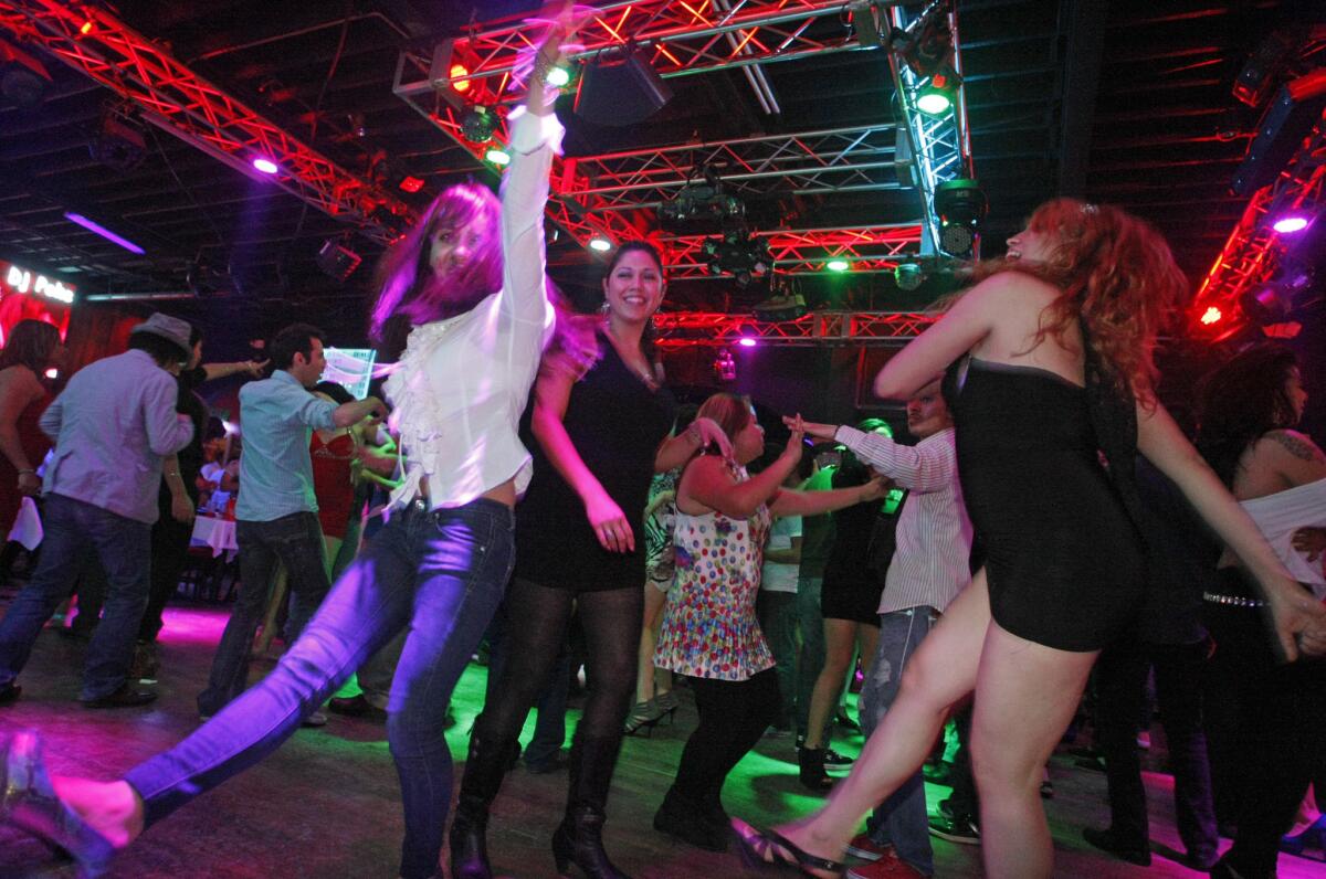 Clubgoers dance with abandon at Las Pulgas, a sprawling Tijuana nightclub often packed with locals, a sign of the border city's night-life resurgence after years in the crossfire of a brutal drug war.