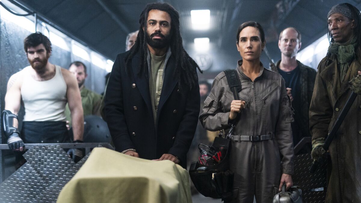 Daveed Diggs and Jennifer Connelly in the season premiere of "Snowpiercer" on TNT.