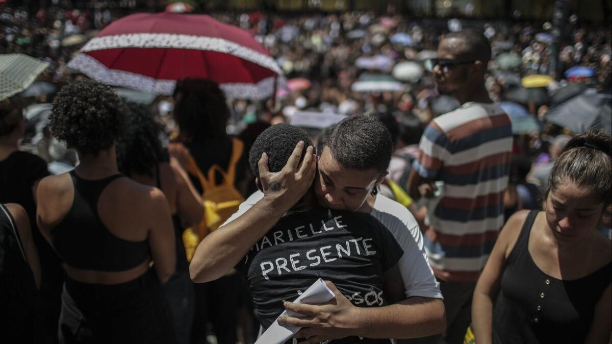 Thousands turn out for the arrival of Brazilian councilwoman Marielle Franco's coffin