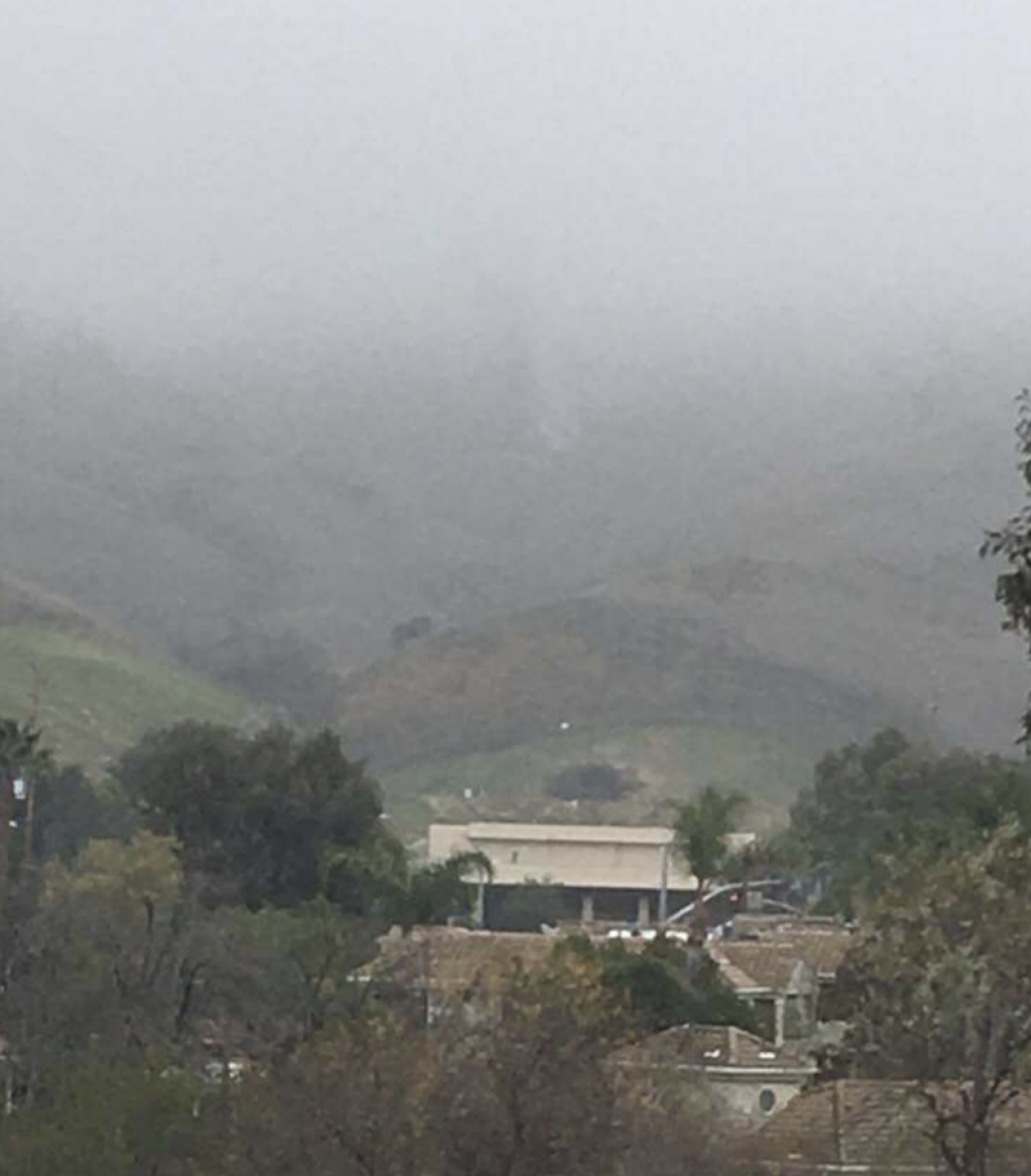 A photo from a resident shows fog near the crash site.