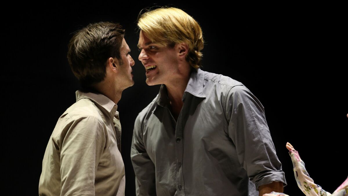 Weller as Eddie and Register as Rodolpho, facing off.