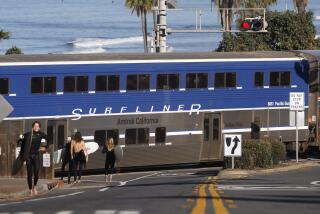 San Diego, CA, November 22, 2023: An Amtrak Surfliner train travels through Powerhouse Park in Del Mar on Wednesday, November 22, 2023. (K.C. Alfred / The San Diego Union-Tribune)