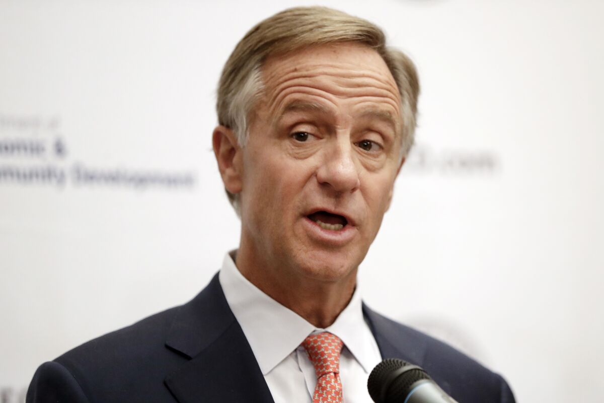 FILE - Tennessee Gov. Bill Haslam speaks during a press conference in Nashville, Tenn., on Nov. 13, 2018. The former Tennessee governor is buying out the majority owner's shares in the Nashville Predators NHL hockey club, in what the team calls a "multi-phased purchase transaction" over the next few yearsm that will make him the team's majority owner. (AP Photo/Mark Humphrey, File)