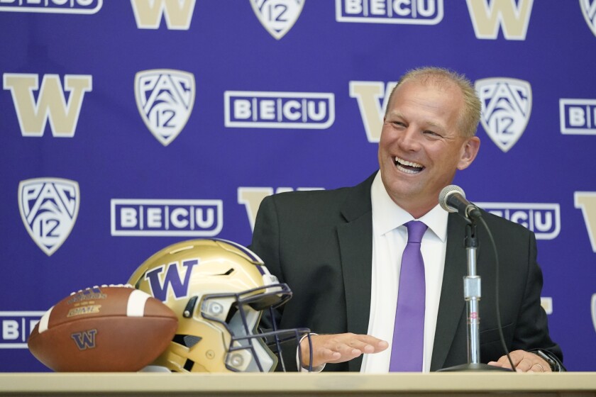 Kalen DeBoer speaks during a news conference, Tuesday, Nov. 30, 2021, in Seattle, to introduce him as the new head NCAA college football coach at the University of Washington. DeBoer has spent the past two seasons as head football coach at Fresno State. (AP Photo/Ted S. Warren)