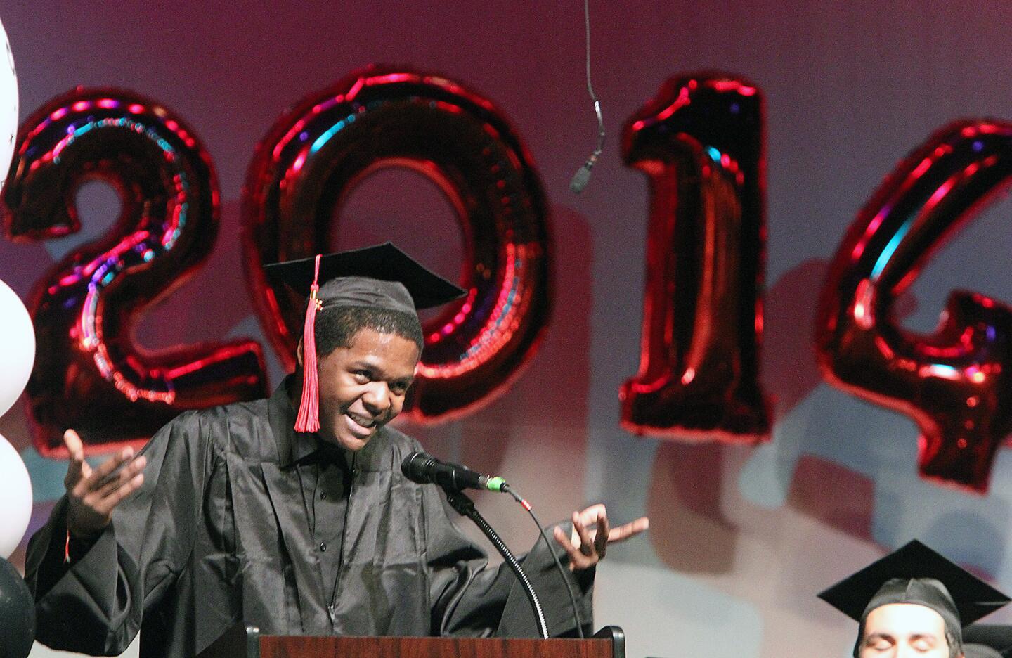 Gregory Brown gives a graduation speech done in rap during the Monterey High graduation ceremony on Wednesday, June 11, 2014.