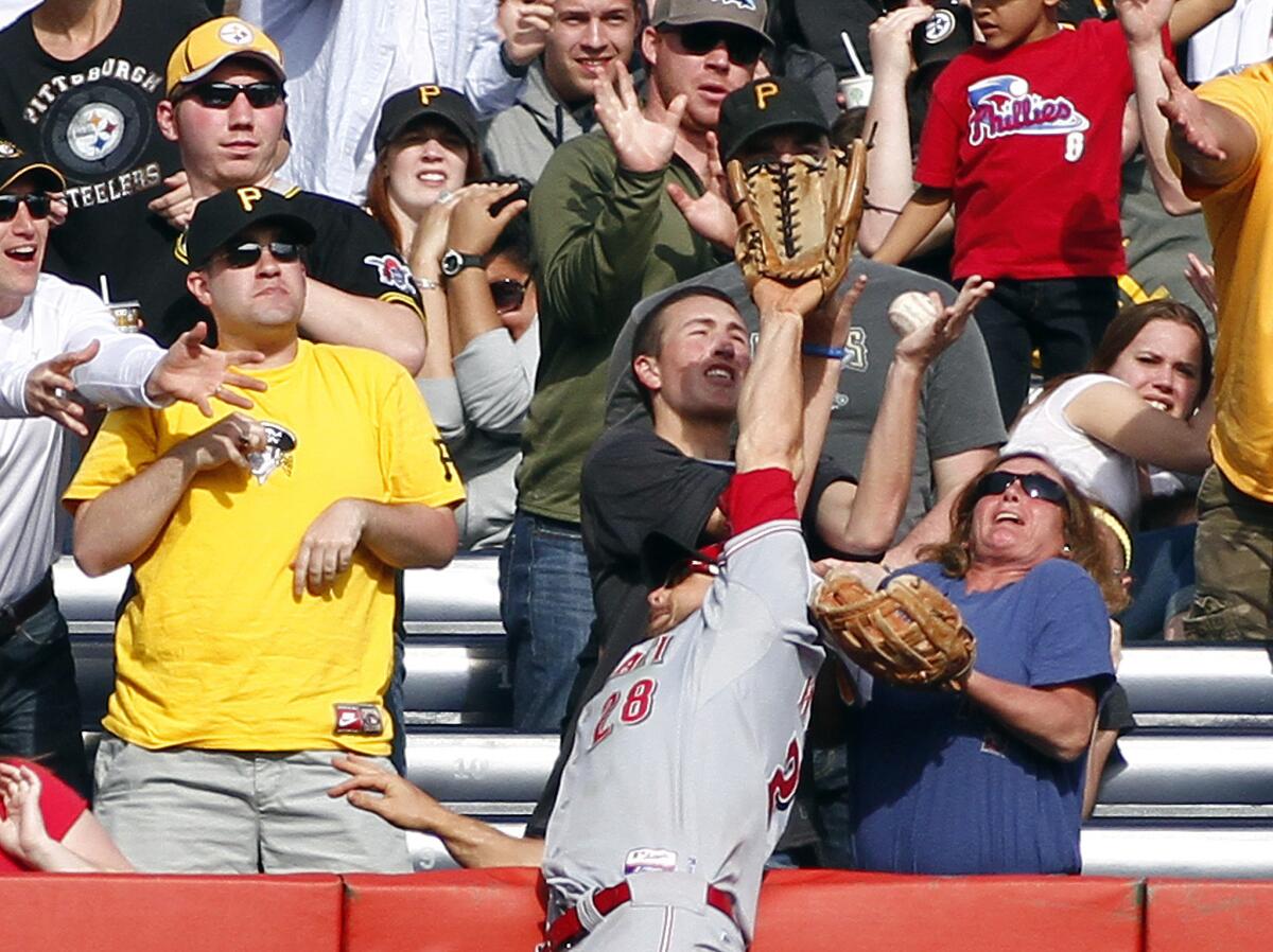 Cincinnati's Chris Heisey can't make the catch on a two-run home run by Pittsburgh's Michael McKenry back in 2013.