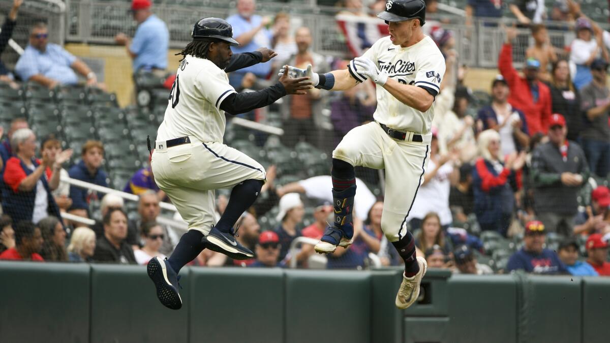 A's hit 5 home runs, rally for 11-10 win over Angels in 10 - The San Diego  Union-Tribune