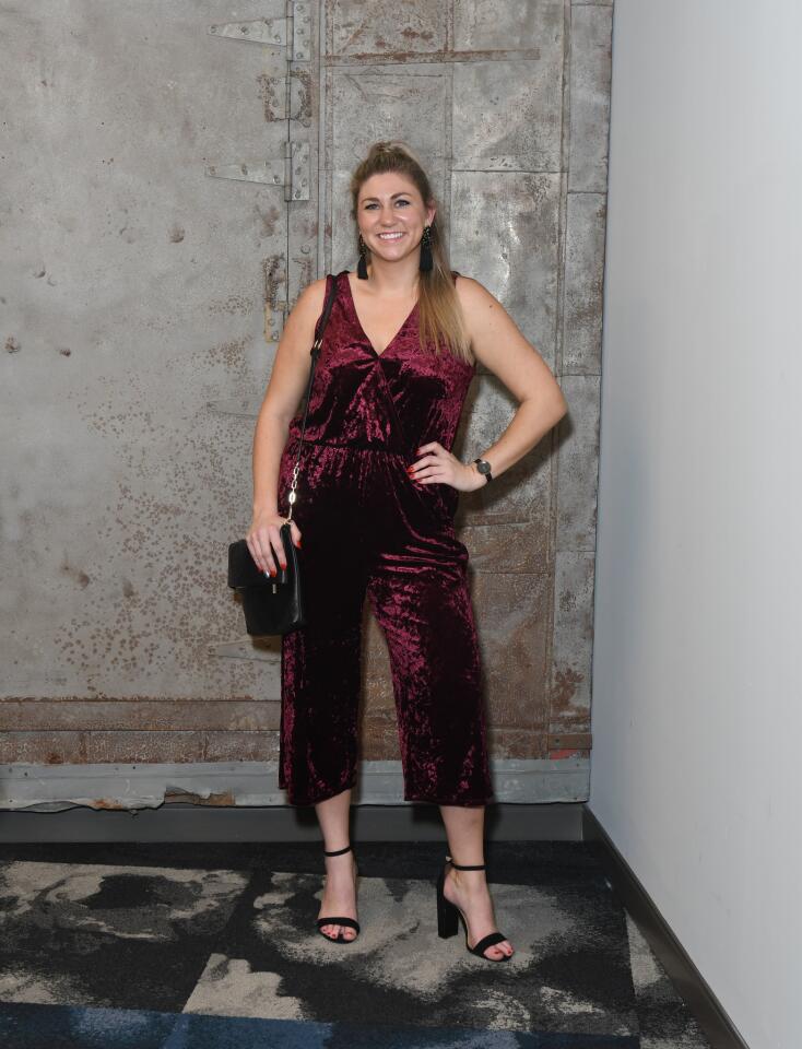 Who: Kirsten Lyerly, 30, Fells Point resident; Jhpiego manager of corporate and foundation partnerships Spotted at: Network Under 40 holiday party at The Fox Building What she wore: Xhilaration burgundy crushed velvet jumpsuit and Merona black strappy heels from Target; black crystal tassel earrings from a local boutique; black shoulder bag from Tory Burch outlet; black watch from mvmtwatches.com. Her look that night: “Fun and funky/holiday party. I like to be a little edgy.”