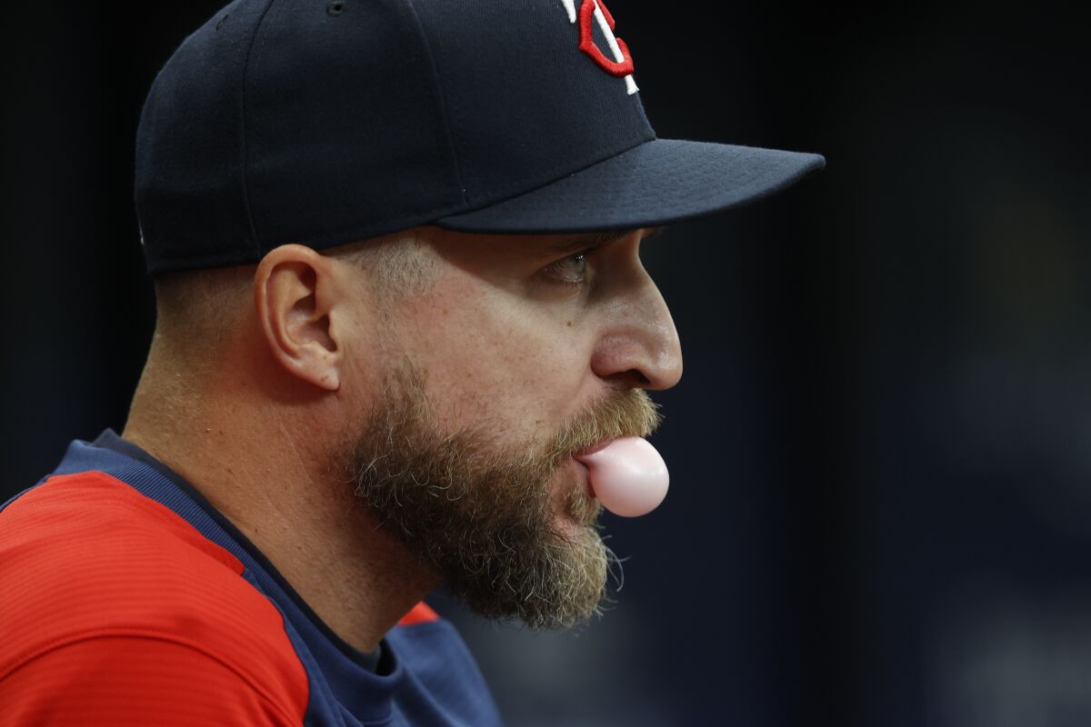 Minnesota Twins manager Rocco Baldelli looks on from the dugout during a baseball game against the Tampa Bay Rays, Sunday, May 1, 2022, in St. Petersburg, Fla. (AP Photo/Scott Audette)
