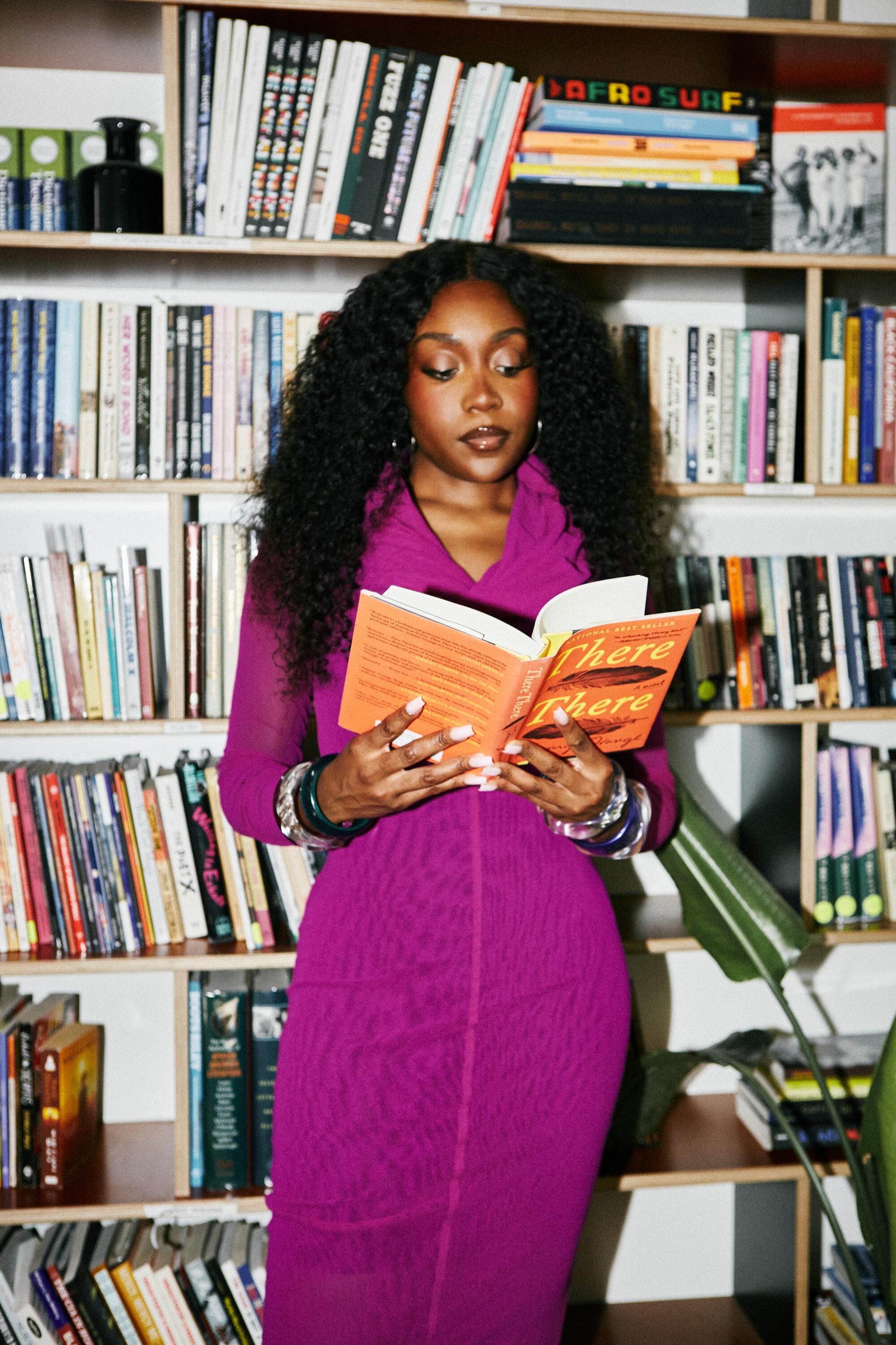 Noname wears Jean-Paul Gaultier from Paumé Los Angeles, vintage Lucite bangles from Paumé Los Angeles