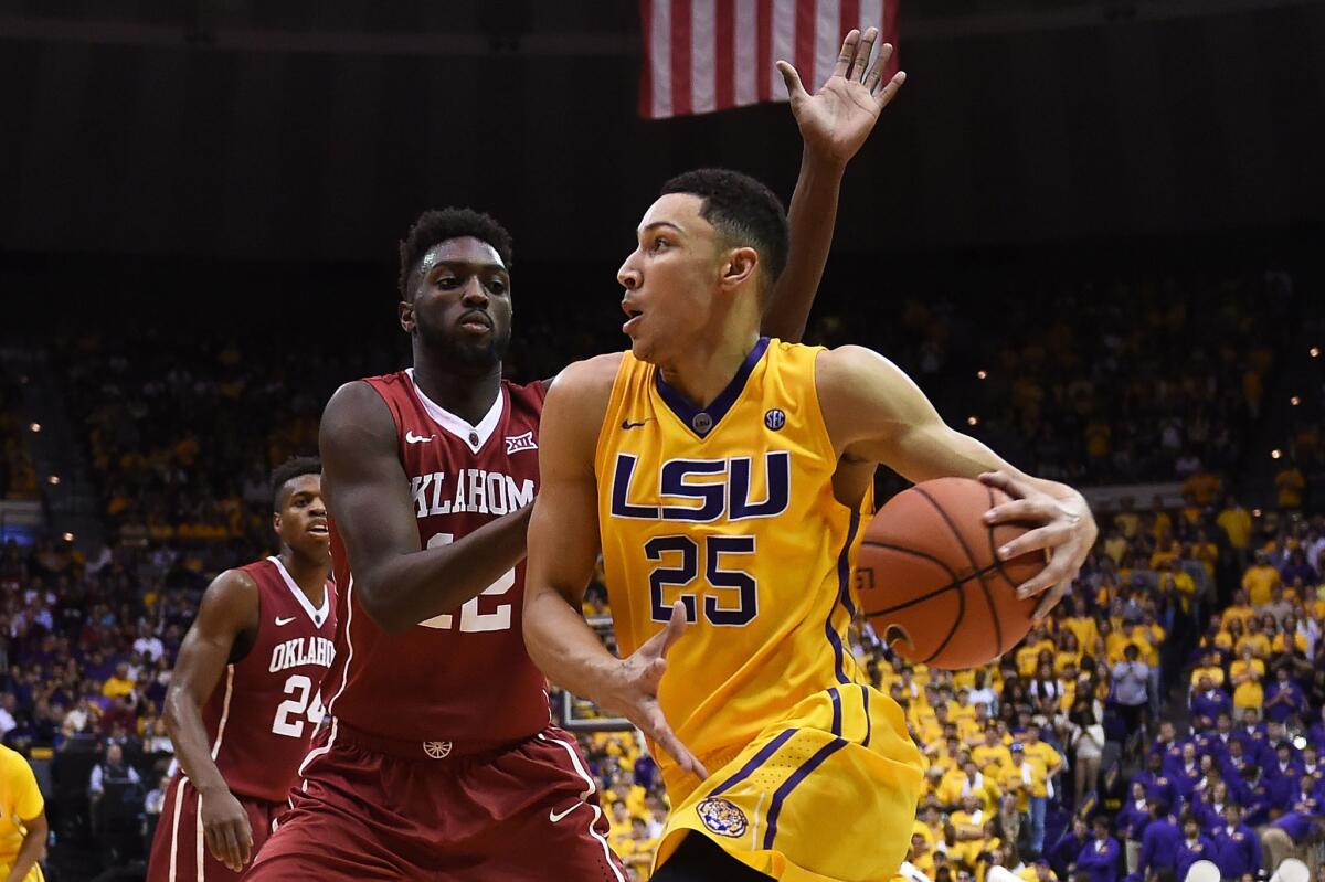 Louisiana State forward Ben Simmons drives to the basket against Oklahoma forward Khadeem Lattin during the second half of a game on Jan. 30.