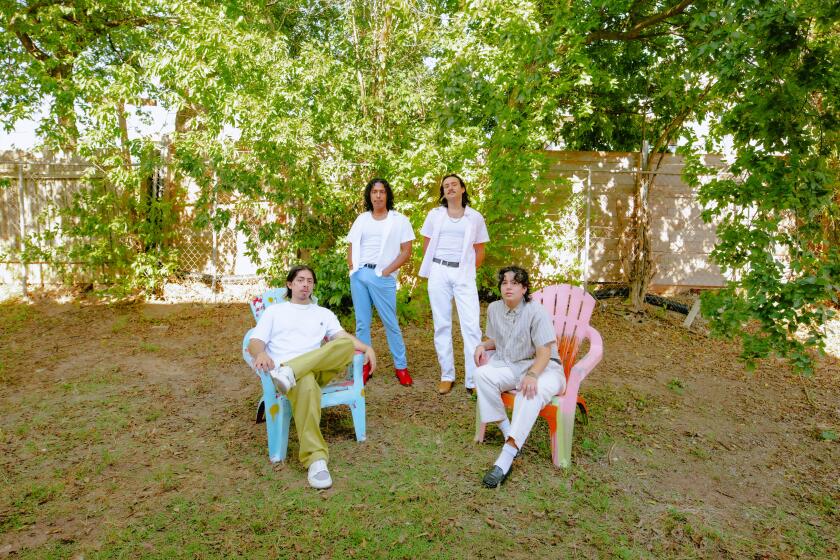 Luna Luna of Dallas, TX in their backyard in Austin, TX on Wednesday, Sept. 20, 2023. Band members (L-R) Kevin Gonzalez (lead vocals), Danny Bonilla (keys/vocals), Ryan Gordon (bass), and Kaylin Martinez (drums) have made a name for themselves with their dreamy, bilingual music.