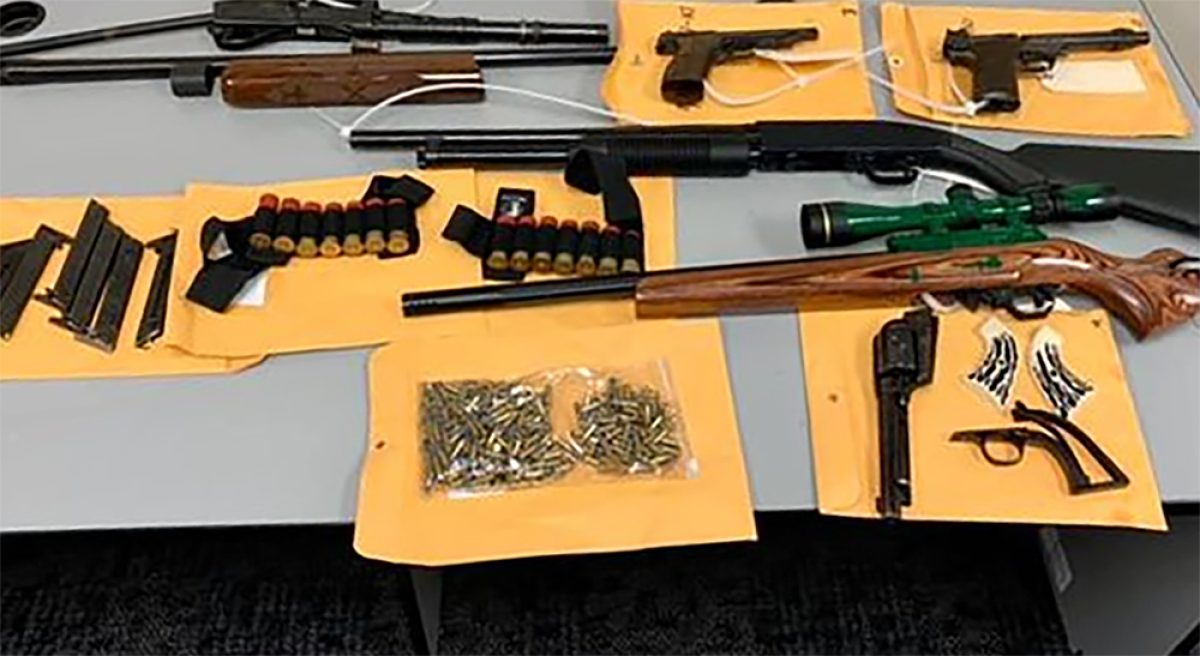 Weapons and ammunition were seized by the Los Angeles County Sheriff's Department. 