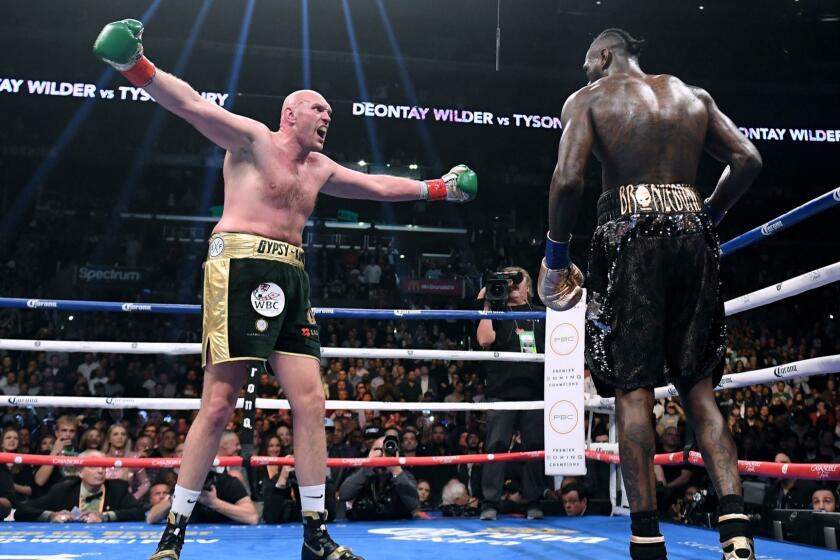 LOS ANGELES, CA - DECEMBER 01: Tyson Fury taunts Deontay Wilder fighting to a draw during the WBC Heavyweight Champioinship at Staples Center on December 1, 2018 in Los Angeles, California. (Photo by Harry How/Getty Images) ** OUTS - ELSENT, FPG, CM - OUTS * NM, PH, VA if sourced by CT, LA or MoD **