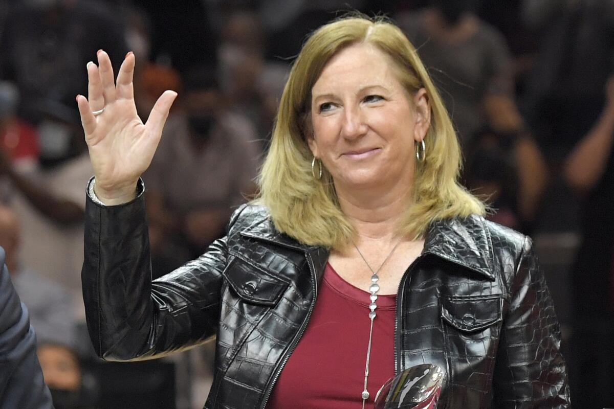 WNBA commissioner Cathy Engelbert waves to the crowd before a playoff game