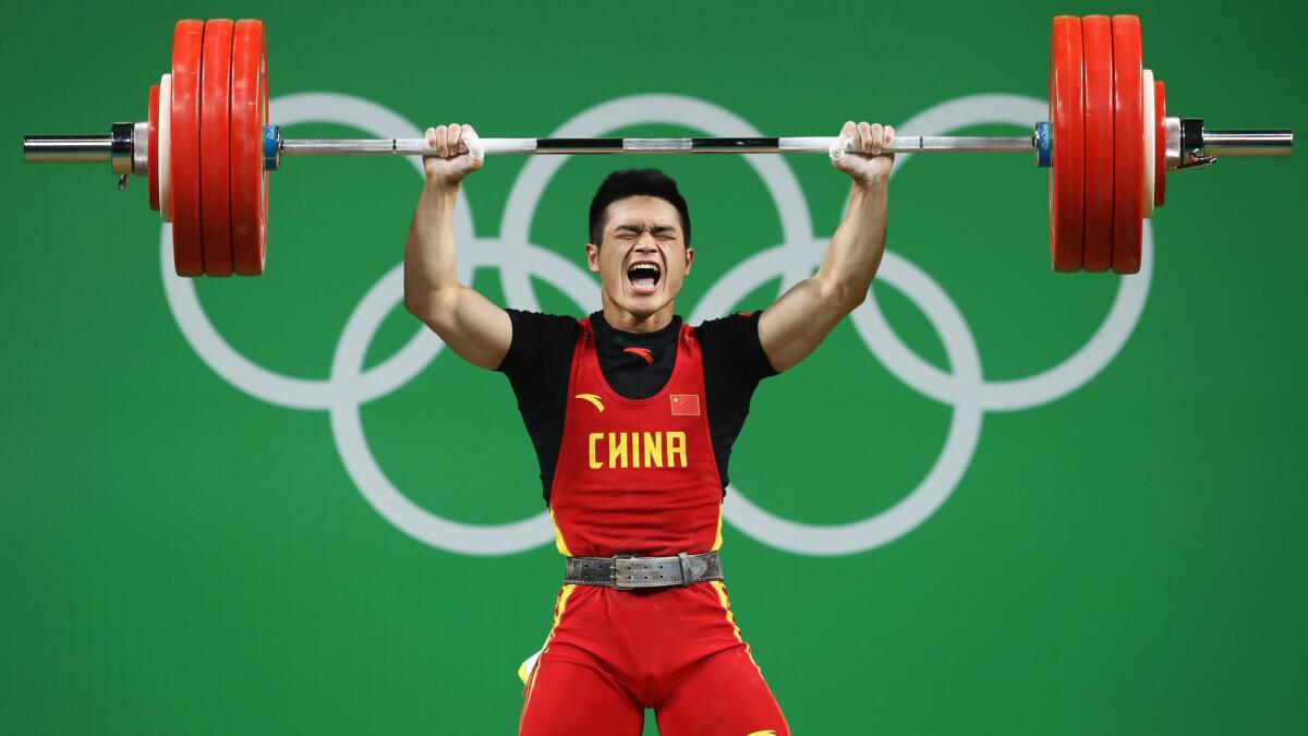 China's Shi Zhiyong competes during the 69-kilogram competition on Tuesday.