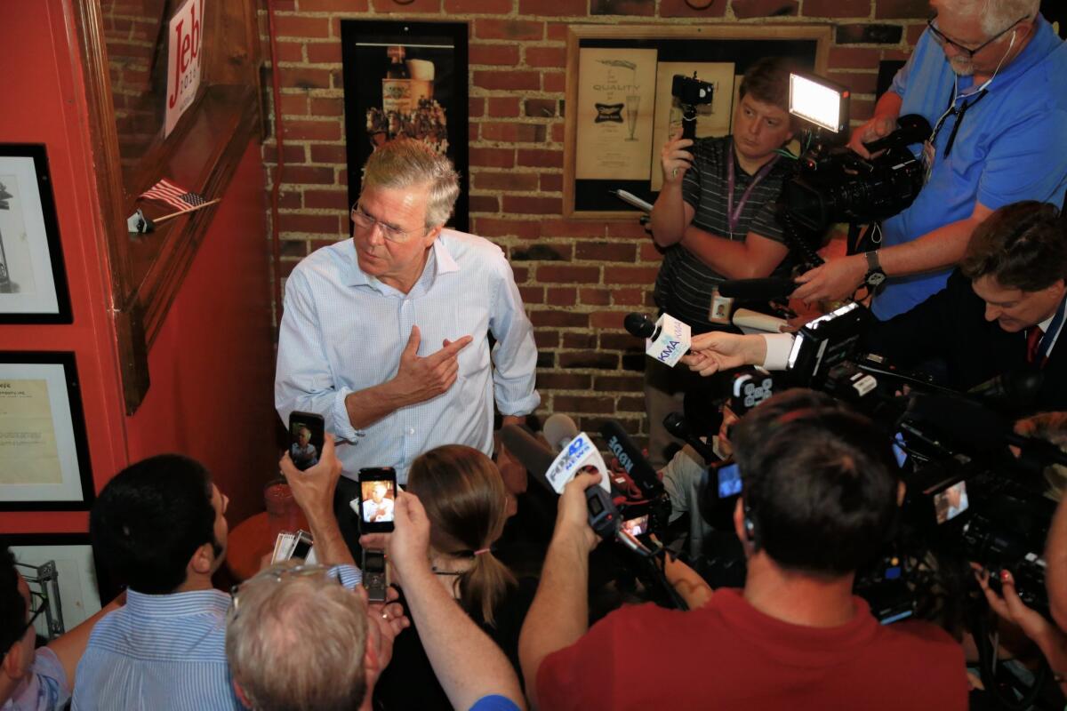Republican presidential candidate, former Florida Gov. Jeb Bush, speaks to the media following a meet and greet event in Council Bluffs, Iowa. (AP Photo/Nati Harnik)