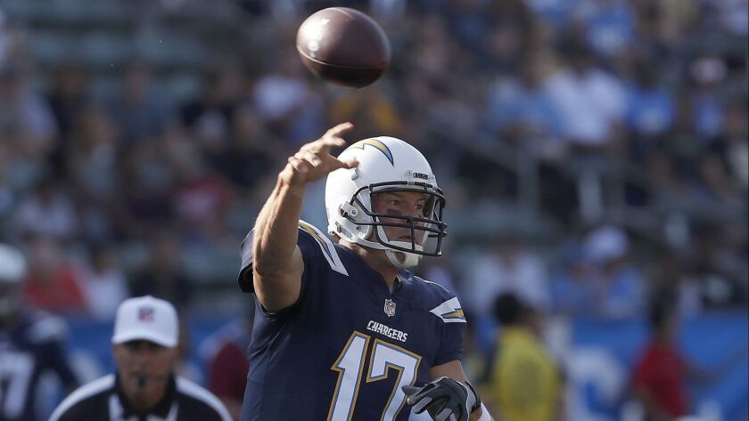 Chargers quarterback Philip Rivers throws a pass against the New Orleans Saints in the first quarter of a preseason game at StubHub Center on Saturday.