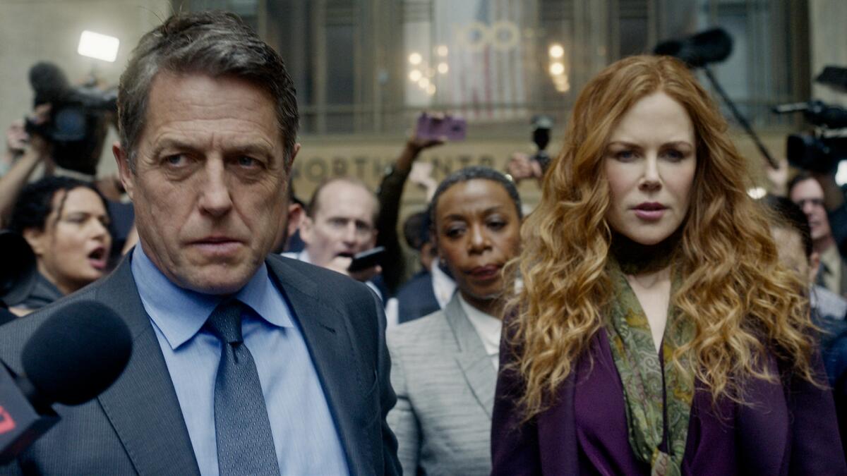 Hugh Grant, Noma Dumezweni and Nicole Kidman in a scene from HBO's "The Undoing." 