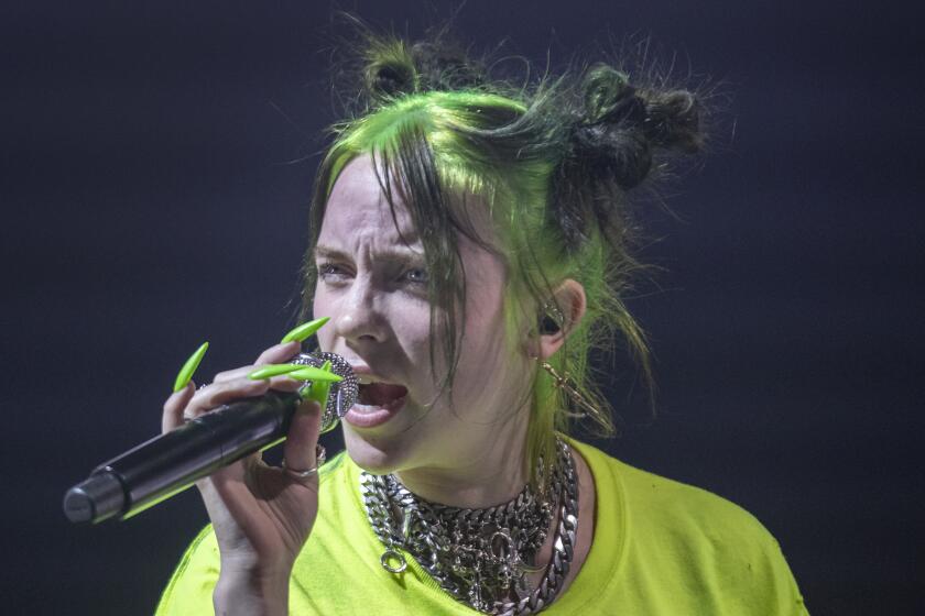 LOS ANGELES, CALIF. -- TUESDAY, JULY 9, 2019: Billie Eilish performs at the Shrine Auditorium in Los Angeles, Calif., on July 9, 2019. (Allen J. Schaben / Los Angeles Times)