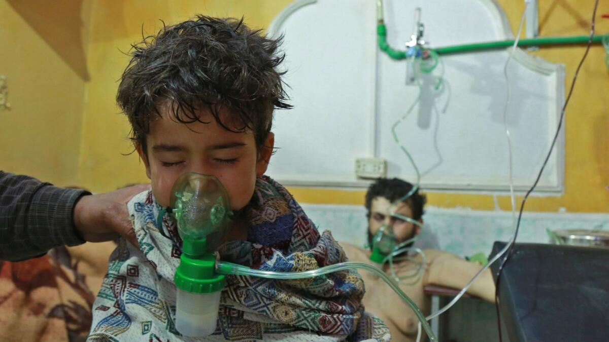 Syrian children and adults receive treatment for a suspected chemical attack at a makeshift clinic in the rebel-held village of al-Shifuniyah in the eastern Ghouta region on the outskirts of Damascus, Syria, on Feb. 25, 2018.