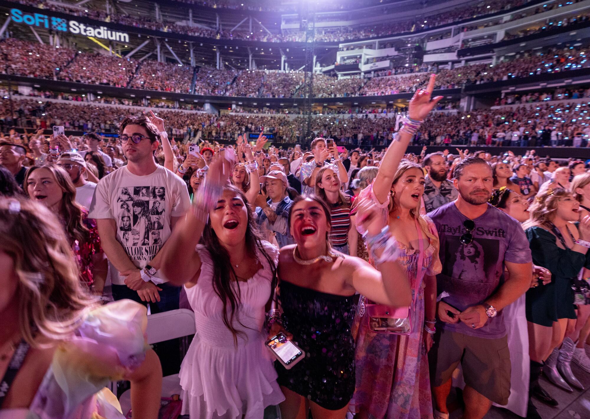 Fans enjoy Taylor Swift's performance at SoFi Stadium in Inglewood.