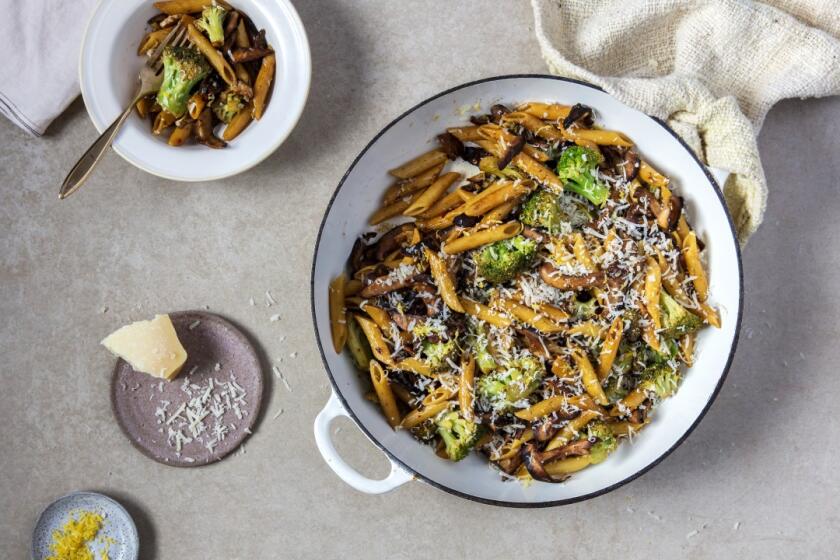 Caramelized lemon adds umami flavor to this vegetarian pasta, packed with mushrooms and broccoli, finished with a grating of fresh parm. Prop styling by Kate Parisian.