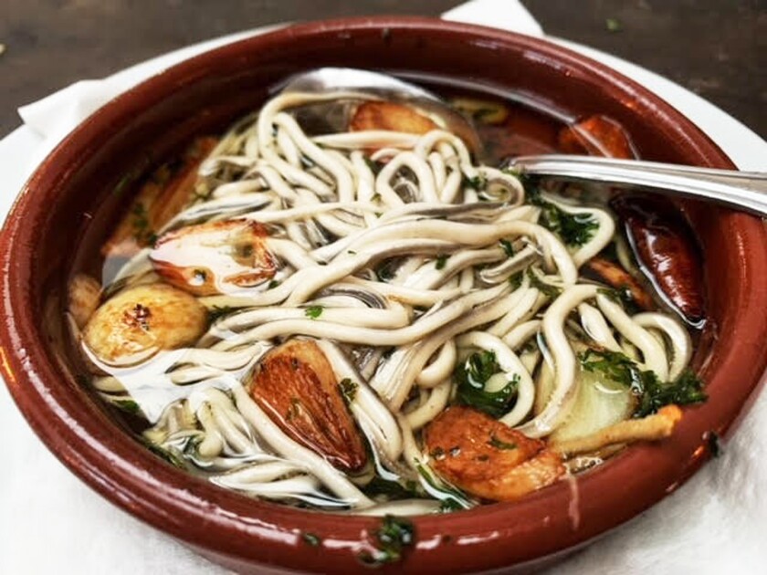 Gulas al Ajillo (Baby eels sautéed in olive oil and garlic).