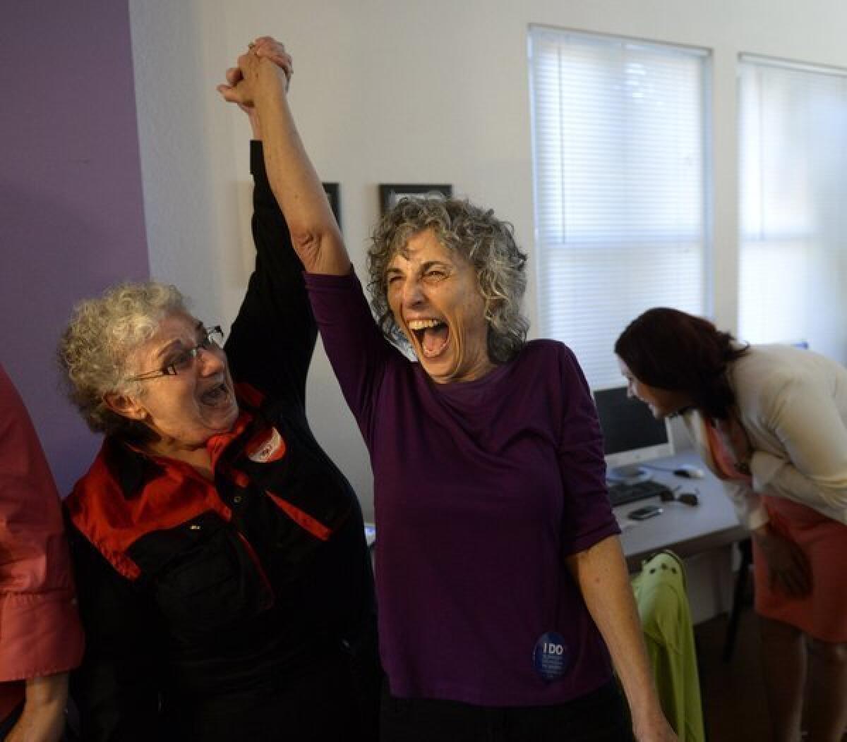 Shelly Bailes, left, and her wife, Ellen Pontac, celebrate in Sacramento after hearing that the Supreme Court struck down the Defense of Marriage Act.