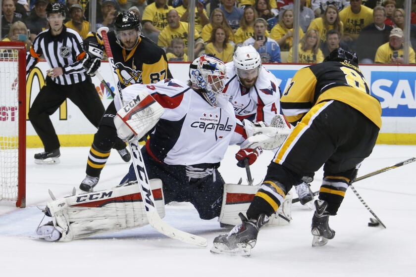 Penguins forward Phil Kessel, right, shoots and scores on Capitals goalie Braden Holtby during the second period of Game 6 of the Eastern Conference semifinals on May 10.